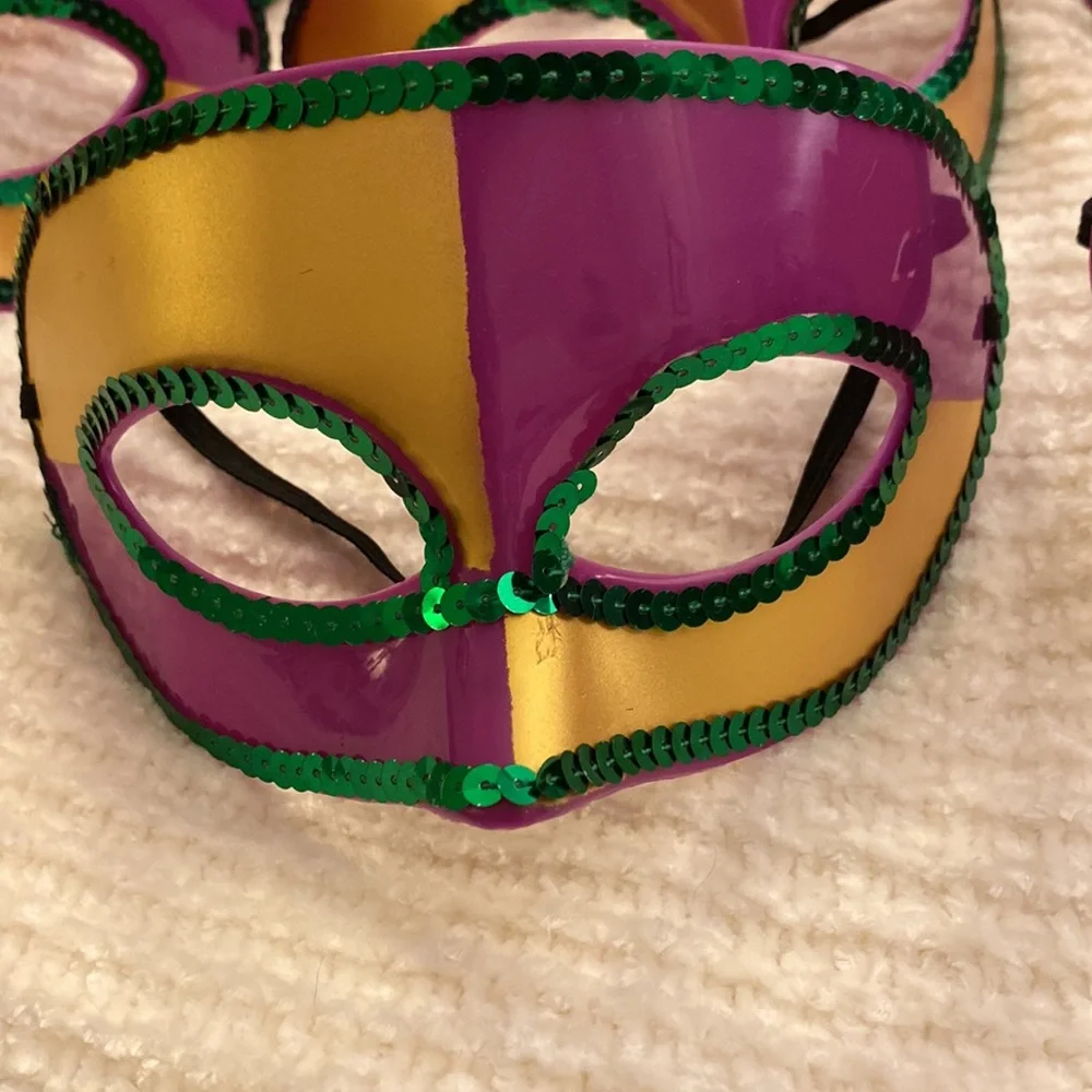 Set of 7 Mardi Gras Masks! Hard plastic purple masks. Very hearty and will last!